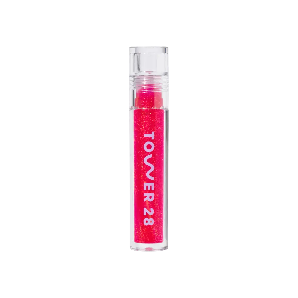 A model wearing the Tower 28 Beauty ShineOn Lip Jelly in the shade Iced XOXO. [Iced XOXO]