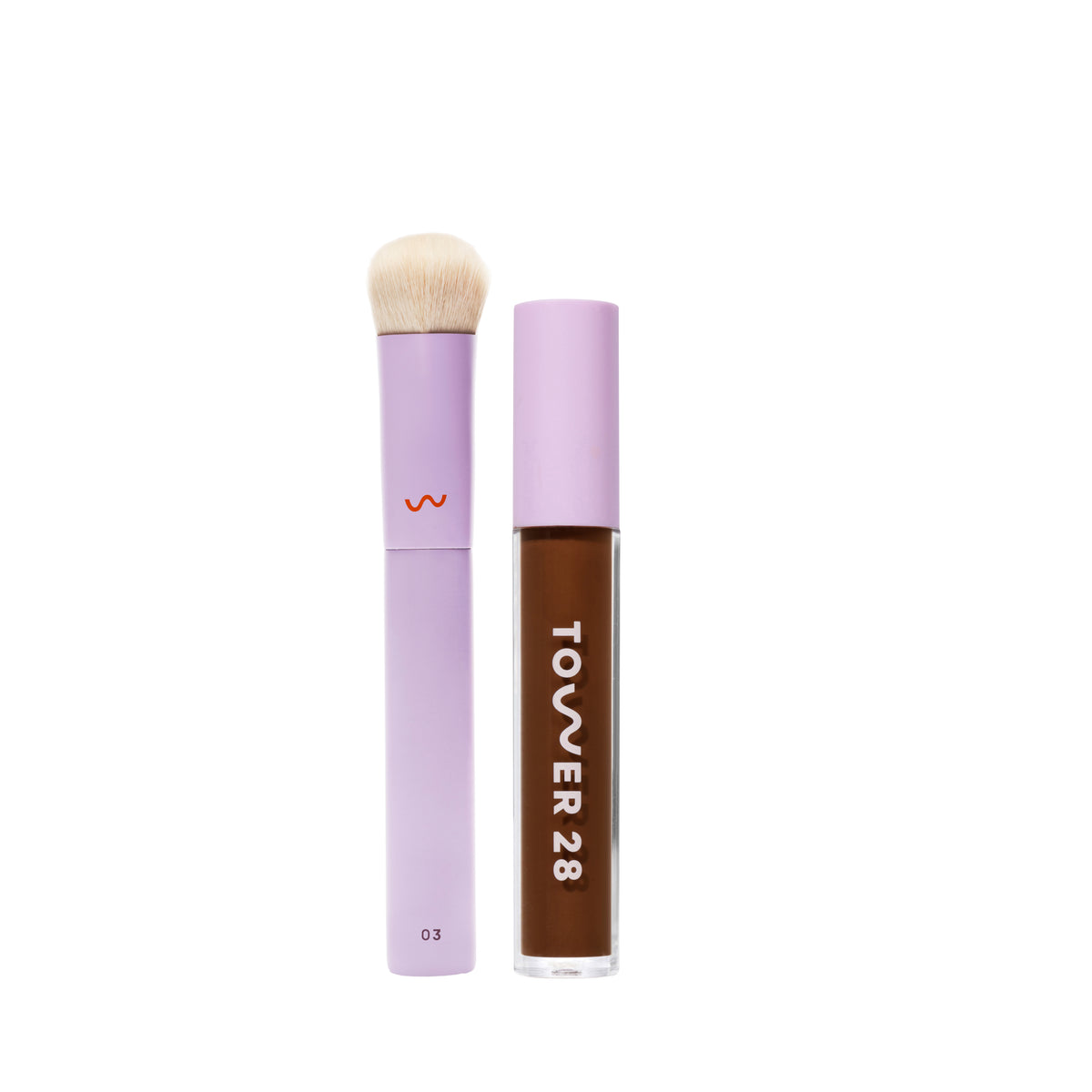[shared] Tower 28 makeup set featuring a lavender lip gloss tube with a brown formula visible inside and a matching lavender makeup brush with cream bristles, shown on a solid white background.