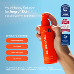 Orange spray bottle held by a hand with text and logos on a blue background [Shared]
